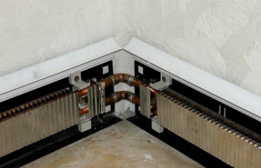 Плинтусное отопление.